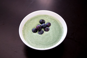Spirulina algae bowl smoothie with yogurt blend