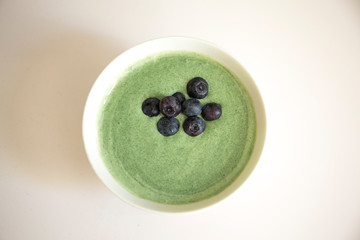 Spirulina algae bowl smoothie with yogurt blend