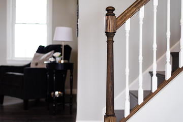 Staircase in living room in bright home