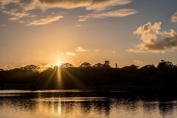 Naklejka premium sunrise over a lake