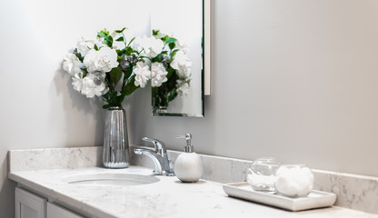 White Bathroom with white flowers