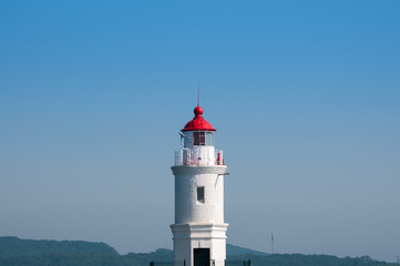 Fototapeta na wymiar Russia, Vladivostok, July 2018: Tokarev lighthouse in summer