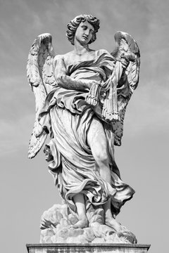 ROME, ITALY - MARCH 27, 2015: Angel with the whips - Ponte Sant'Angelo - Angels bridge - designed by Lazzaro Morelli