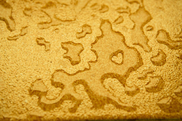 Water drops on Yellow surface