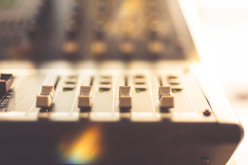 Professional audio mixing console with faders and adjusting knobs,TV equipment Black and White...