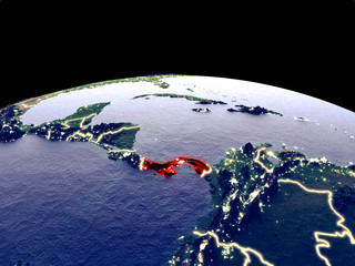 Panama from space on planet Earth at night with bright city lights. Detailed plastic planet surface with real mountains.