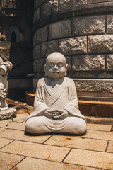 statues of  baby monks