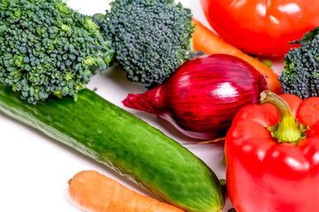 a fresh group of vegetables on white background