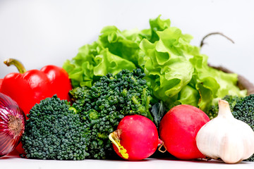a fresh group of vegetables on white background