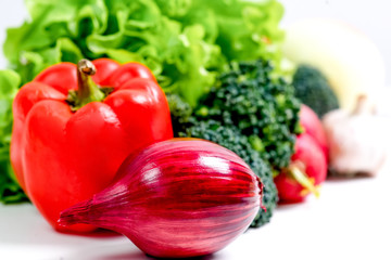 a fresh group of vegetables on white background