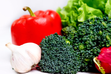 a fresh group of vegetables on white background