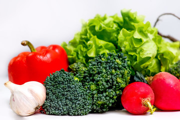 a fresh group of vegetables on white background