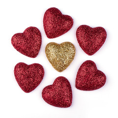 Gold and red hearts isolated