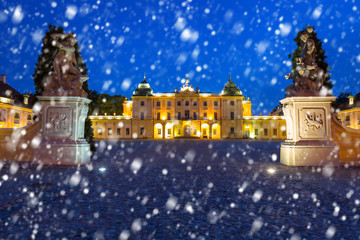 The Branicki Palace at night with falling snow, Bialystok. Poland