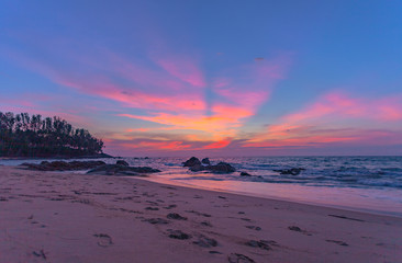 scenery sunset on the rock at Pilay Natai beach Phang Nga