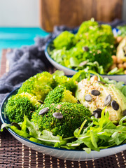 Green plant based salad with broccoli and avocado