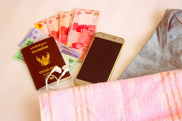 Travel accessories costumes for women. Passports, cloth, The cost of travel maps prepared for the trip. Vintage style
