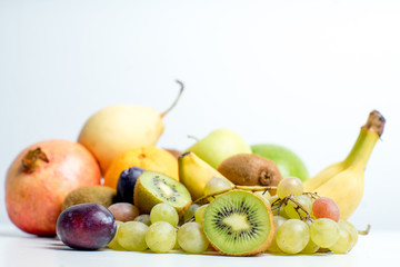 Creative layout made of fruits on a white background