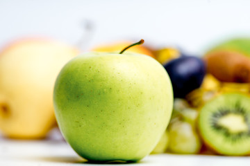Creative layout made of fruits on a white background
