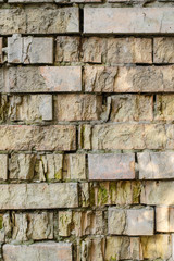 Details of textured aged brick wall. Can be used as background. Vertikal.
