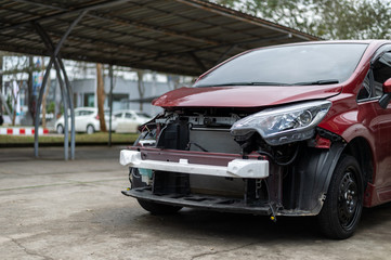 Fototapeta premium car in repair station and body shop with soft-focus and over light in the background