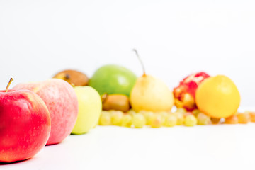 Creative layout made of fruits on a white background