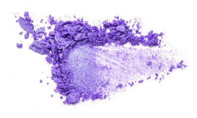 Eye shadow on a white background. Scattered blush sample for makeup. Purple colour