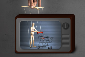 Fake News on TV. Control over the behavior of the buyer. Man with  shopping trolley from the...