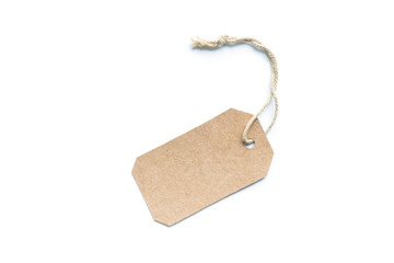 Blank brown cardboard price tag or label tag with thread isolated on white background.
