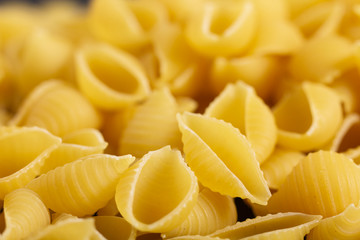 pasta on black background. Top view with copy space