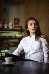 The girl in the cafe breakfast