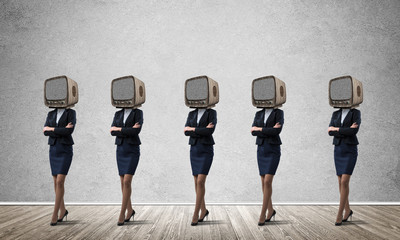 Business women with old TV instead of head.