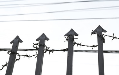 Barbed Wire Surround Steel Arrow , High Fence, Detained and No Freedom Symbol