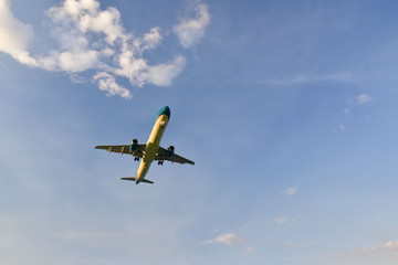 Flight of the plane past the clouds. Copy space fot text