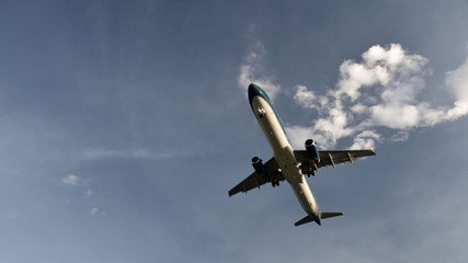 The plane takes off from the clouds. Copy space fot text