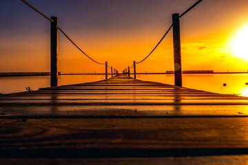 Silhouette of a bridge at sunset