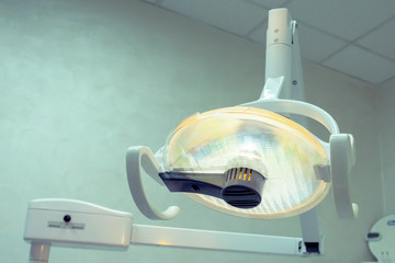 Close-up of the lamp in dental clinic. Interior of dentist office. Health care and medicine