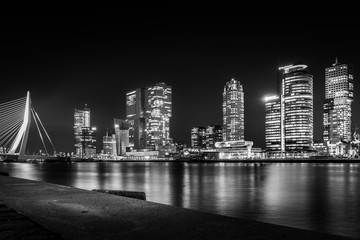 ROTTERDAM, NETHERLANDS - DECEMBER 4 2018: Skyline of Rotterdam in black and white on a windless evening