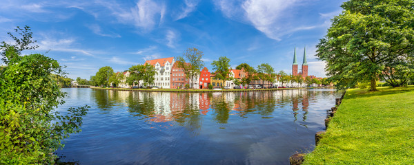 A panoramic view of the old town of Luebeck (German: Lübeck), Germany, across the river Trave.