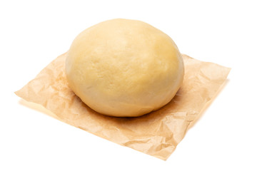 unrolled and unbaked Shortcrust pastry dough on white background