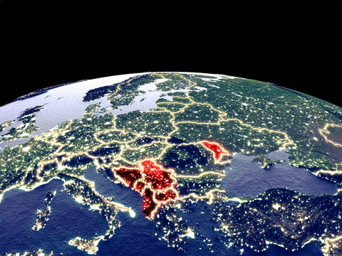 CEFTA countries from space on planet Earth at night with bright city lights. Detailed plastic planet surface with real mountains.