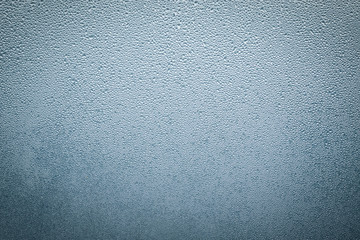 Misted wet window glass as background texture
