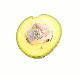 Slice half of green thai avocado on white background