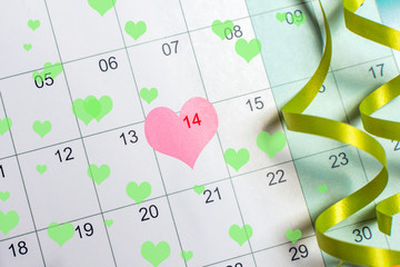 Calendar with heart decoration. St Valentine's day. Holiday concept.