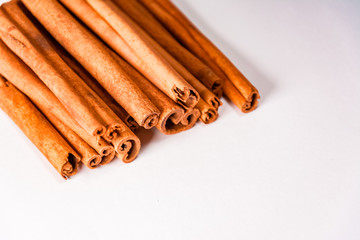 cinnamon sticks on white background