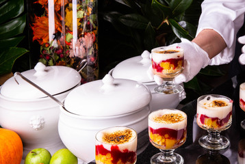 Dessert giving of a dish to the guest