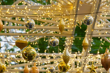 Fototapeta na wymiar golden Christmas balls, silve Christmas balls and small lights