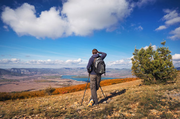 Photographer on top of mountain.