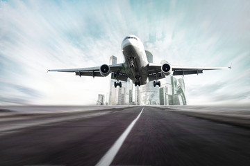 plane takes off against the city