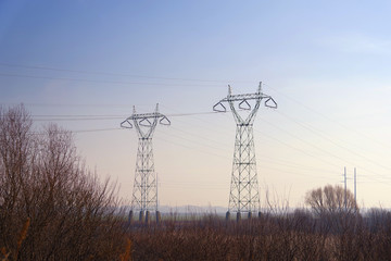 Electric power pylons in the nature